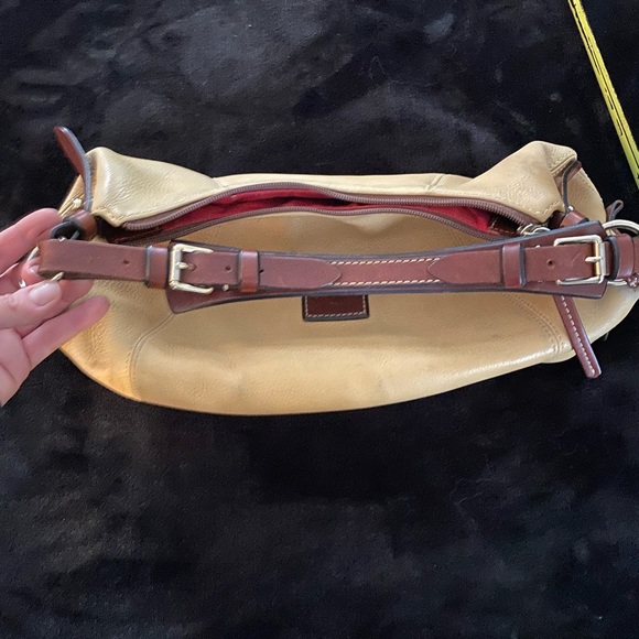 Dooney and Bourke bag. Soft tan/golden color with red interior - Picture 7 of 10
